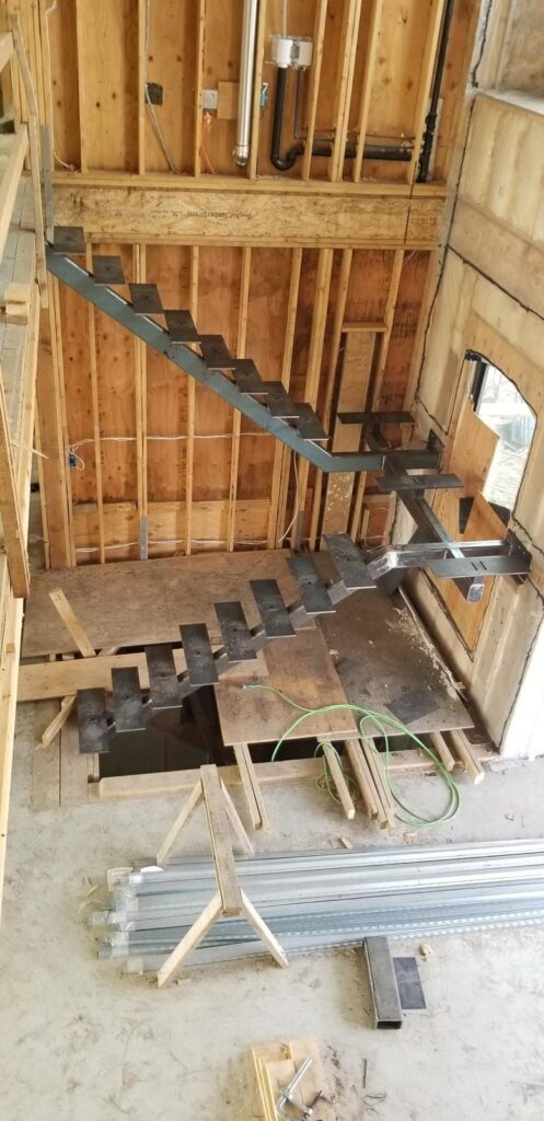 Precision Welding for Floating Stairs Support at 29120 Maclure Rd., Abbotsford