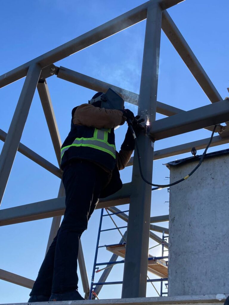 Bolting Steel Columns for Structural Support at 8486 Oak Street, Vancouver
