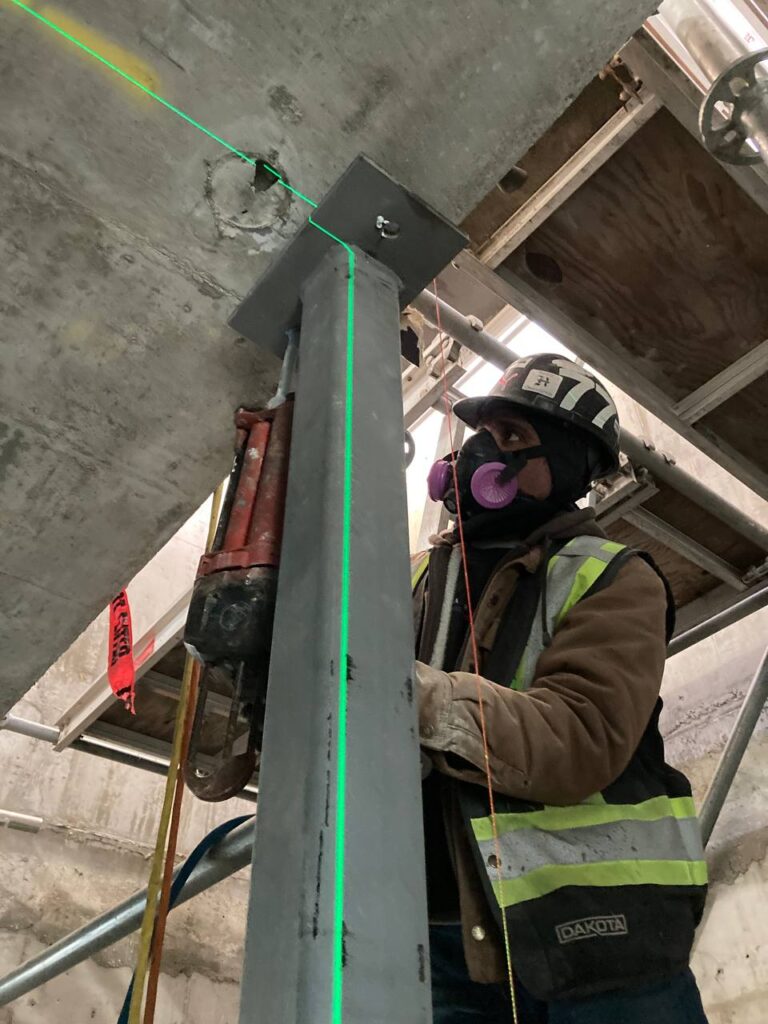 Securing Horizontal and Vertical Steel Beams at 8486 Oak Street, Vancouver