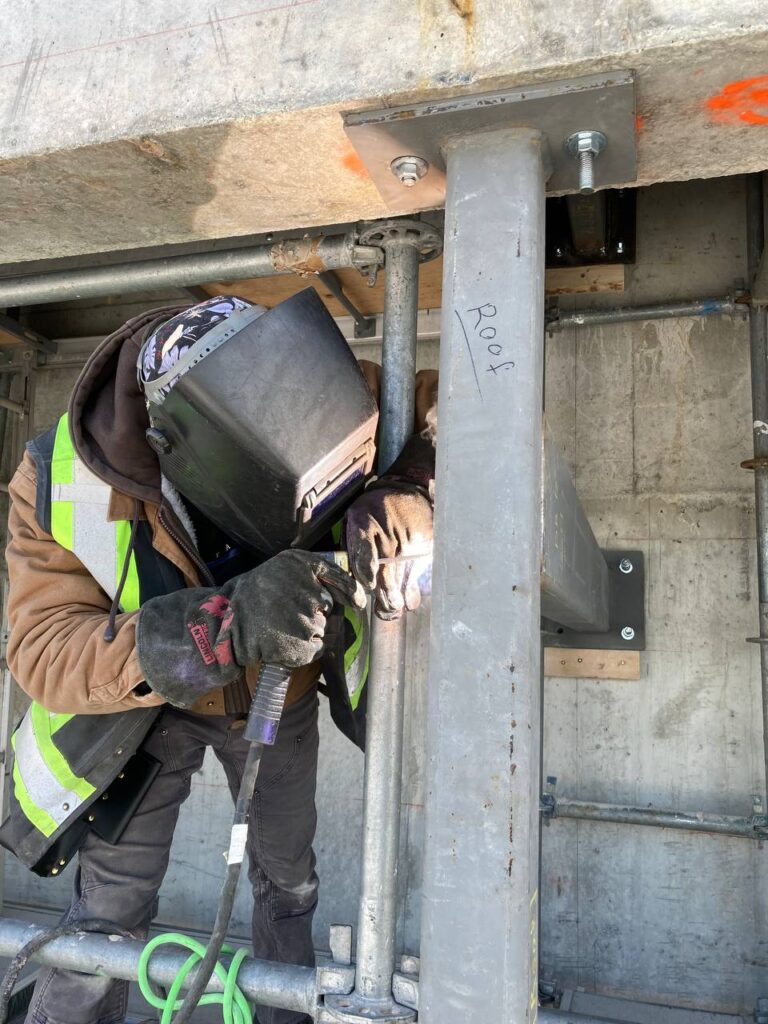 Preparing Steel Foundation for Concrete Pour at 8486 Oak Street, Vancouver
