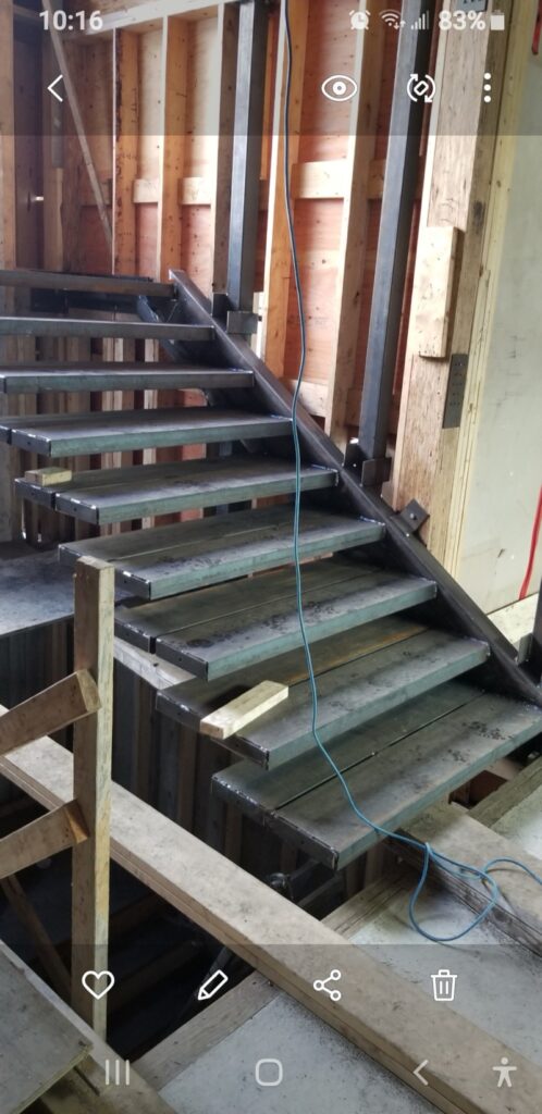 Modern custom steel stair design at 690 Knockmaroon Rd., West Vancouver