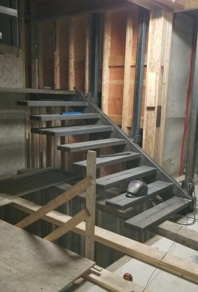 Precision-welded steel stairs installed at 690 Knockmaroon Rd., West Vancouver