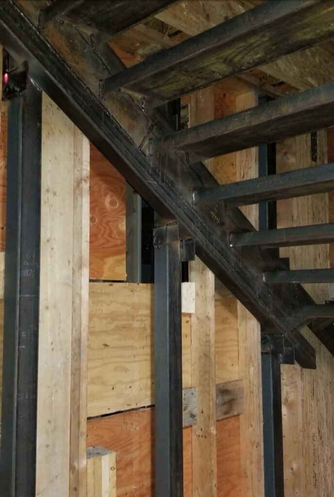 Custom steel staircase under construction at 690 Knockmaroon Rd., West Vancouver