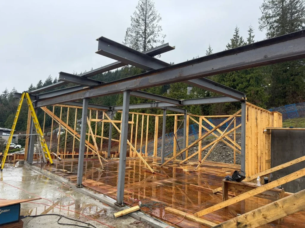 CWB certified welder performing structural steel welding on residential steel frame project