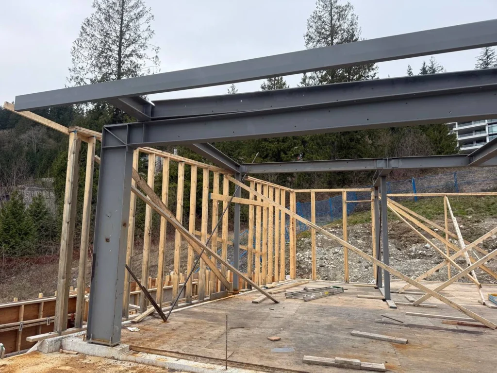 Residential structural steel framework during construction phase in British Columbia
